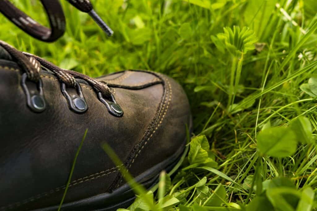 a durable water repellent Black Leather Shoe on the Grass