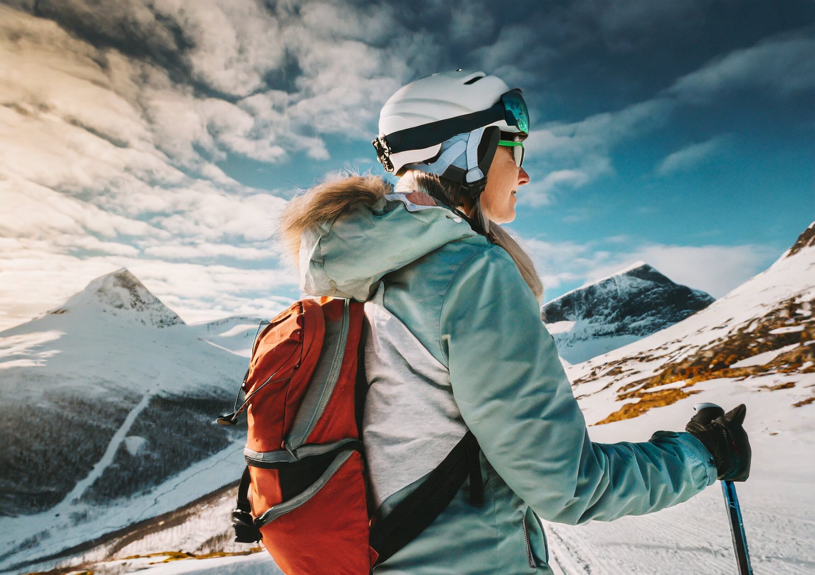 a skier wearing a women's ski jacket