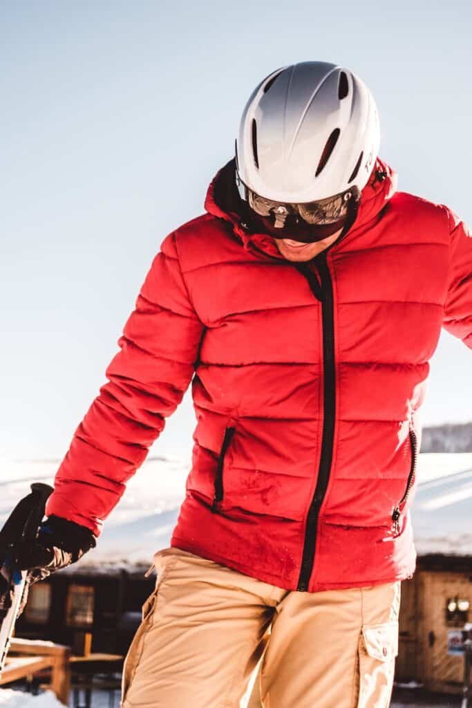 Woman  Standing Against the Sky wearing an insulated ski jacket